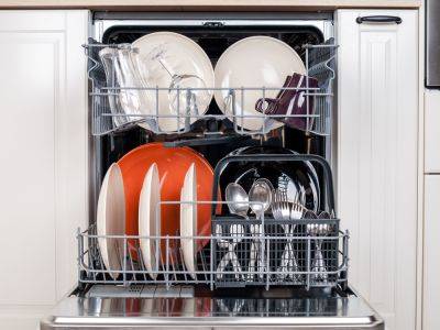 Should You Put Silverware Pointed Up or Down in the Dishwasher? - bhg.com