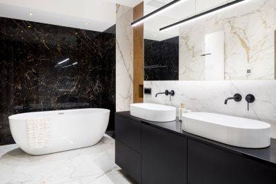 Meet the Newest Moody Design Trend: All-Black Bathrooms - bhg.com