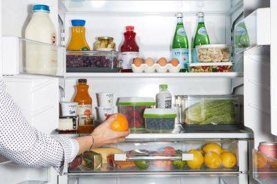 Here's What to Throw Out When Spring Cleaning Your Fridge - bhg.com